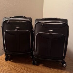 New--Olympia Tuscany 21 inch spinner carry ons  black/gray, 14X8X21 new